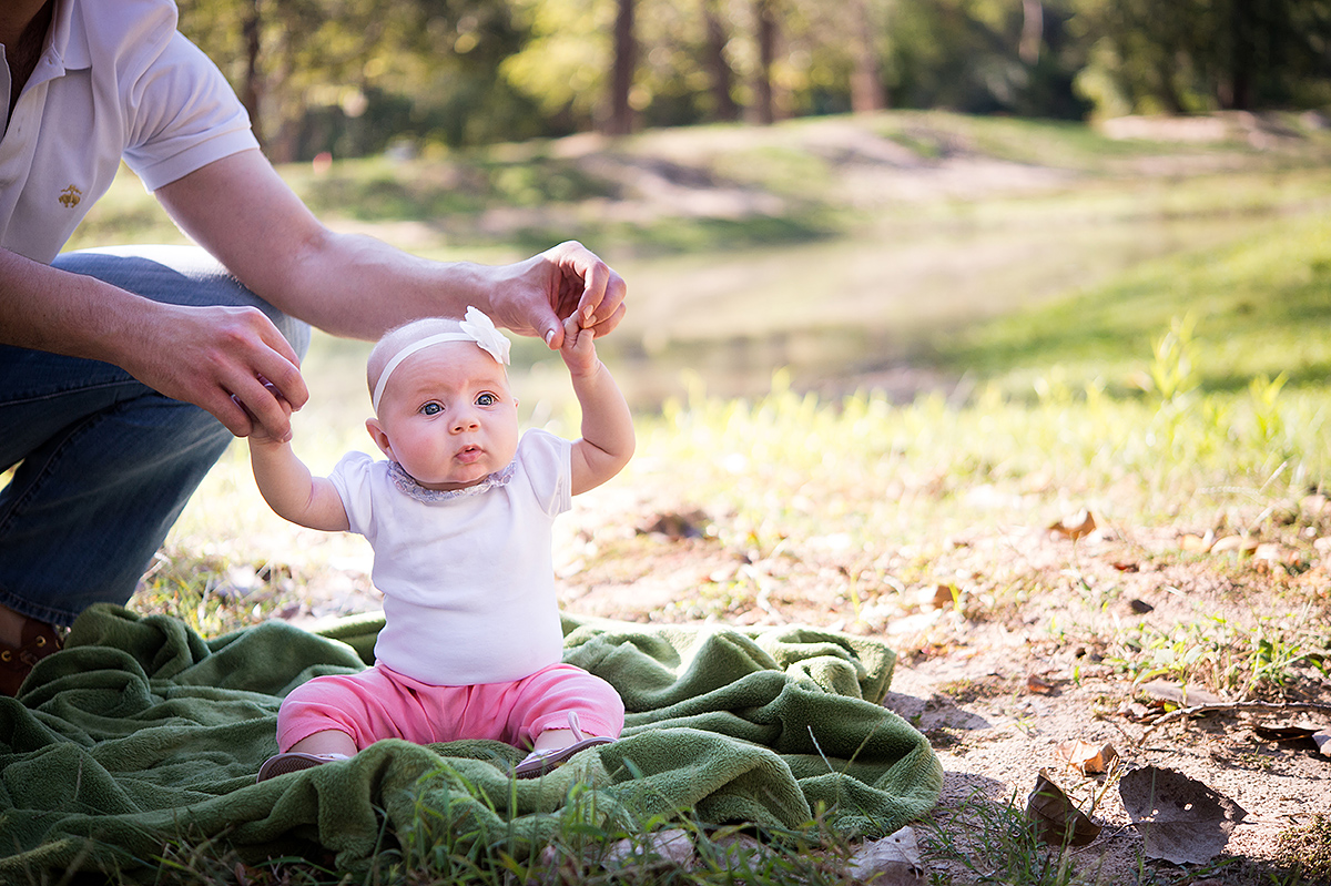 little child sitting up